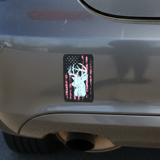 Sticker with a deer design on a car's rear bumper