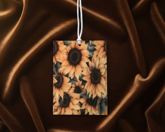 Decorative Air Freshener with sunflower pattern on a brown satin background