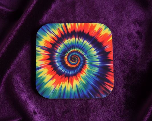 Colorful tie-dye spiral design on a purple fabric background